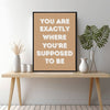black frame motivational poster wall art canvas on the table
