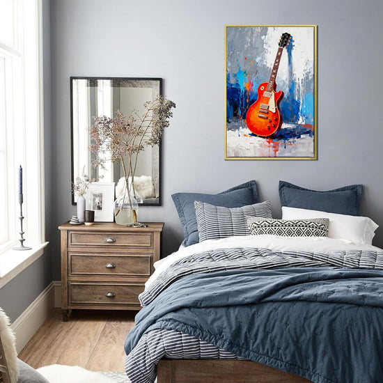 gold frame art canvas painting showing a colorful electric guitar