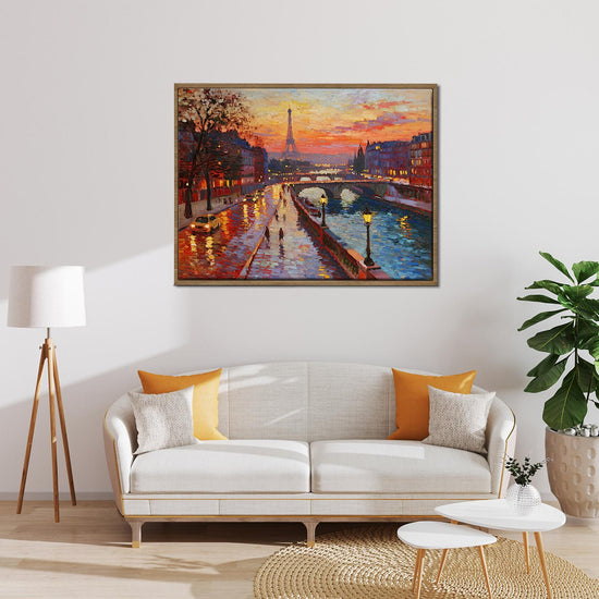 light oak color frame wall art painting depicting the beautiful sunset scenery of the Seine River in Paris hangs on the wall of the living room