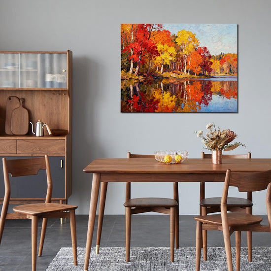 wall art painting of an autumn lakeside hangs on a simple and bright interior wall