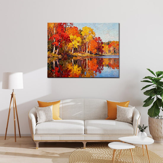 wall art painting of an autumn lakeside hangs on a simple and bright interior wall