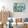 wall art canvas in the living room showing two bluebirds perched on a branch.
