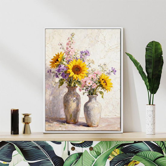 white frame wall art canvas depicts two vases filled with colorful flowers