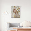 living room wall art canvas painting depicts a woman wearing white flowers