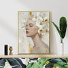 gold frame wall art canvas painting depicts a woman wearing white flowers
