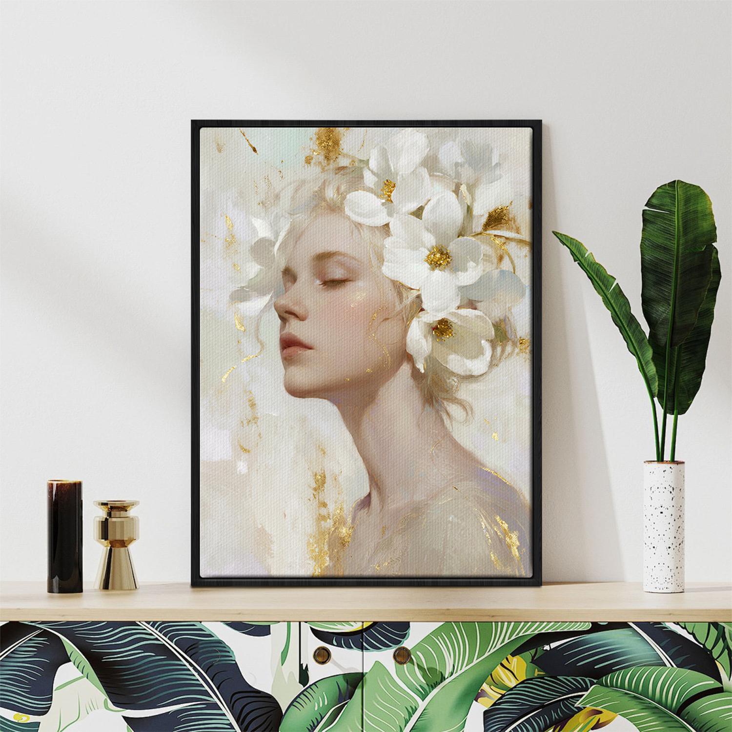 black frame wall art canvas painting depicts a woman wearing white flowers