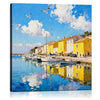 wall art canvas painting depicts a bright harbor scene in a seaside town