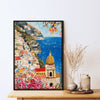 black frame seaside town scenery wall art painting on the table