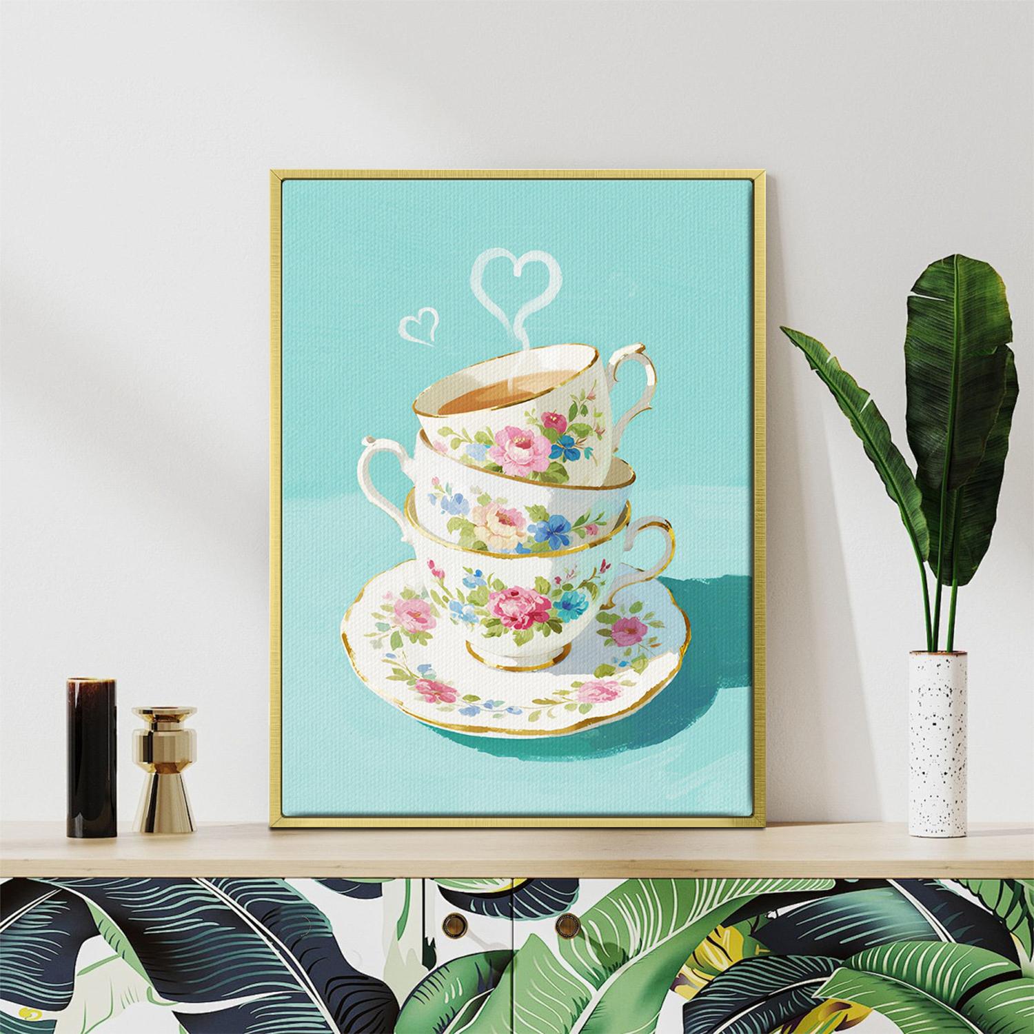 gold frame wall art canvas painting depicts stacked floral teacups