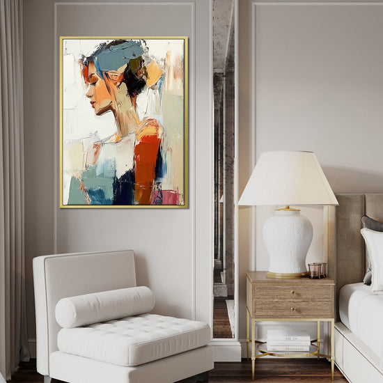 gold frame wall art women painting above the sofa