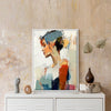 white frame wall art women painting on the table