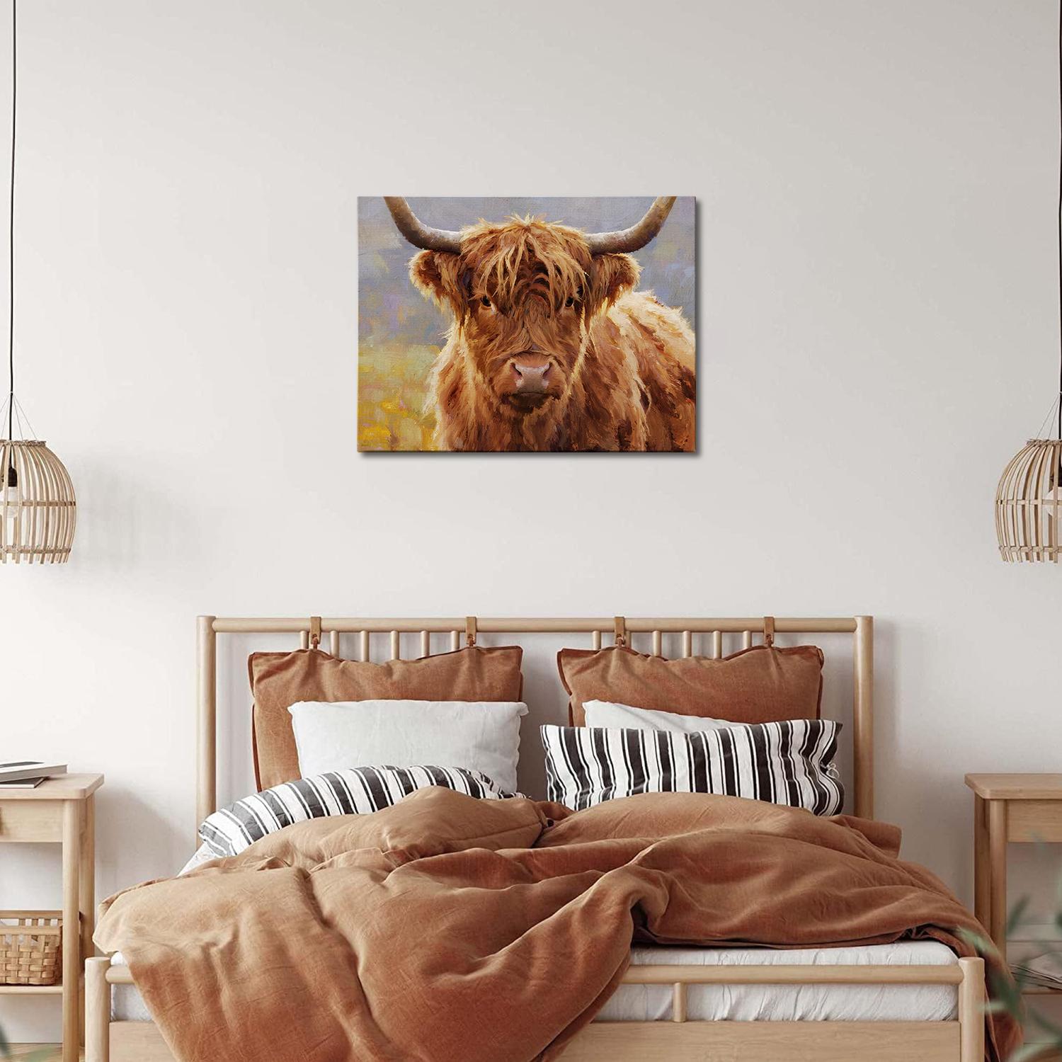 wall art canvas in the bedroom depicts highland cattle