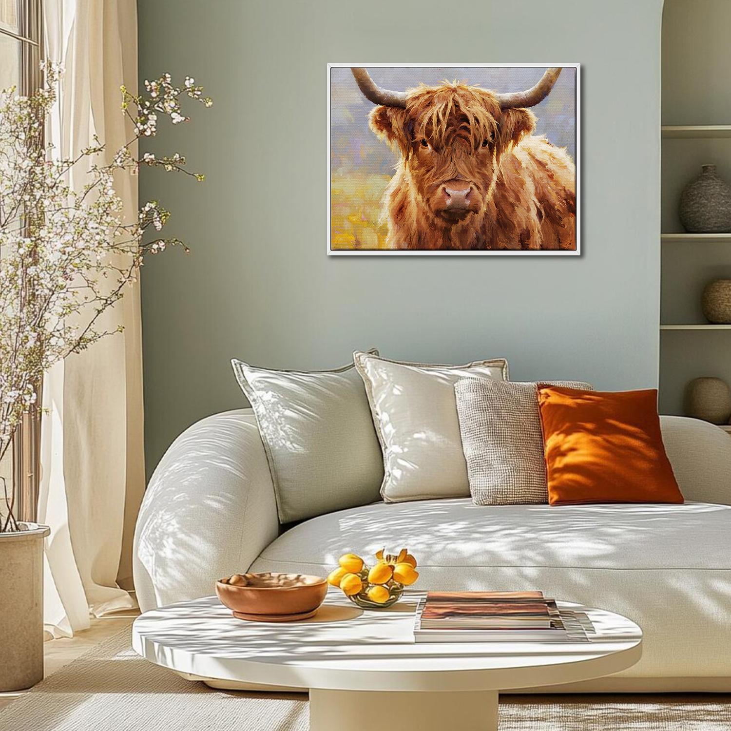 white frame wall art canvas depicts highland cattle