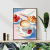 coffee frame wall art canvas painting depicts a cozy scene with latte art coffee, strawberries, croissants and an open book.
