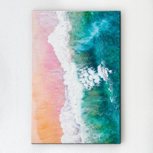 wall art canvas depicts pink sand beach and white waves