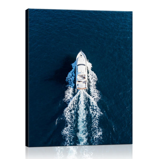 wall art canvas depicts a white yacht sails on the deep blue sea