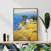 coffee frame wall art painting depicting a cliffside cottage by the sea