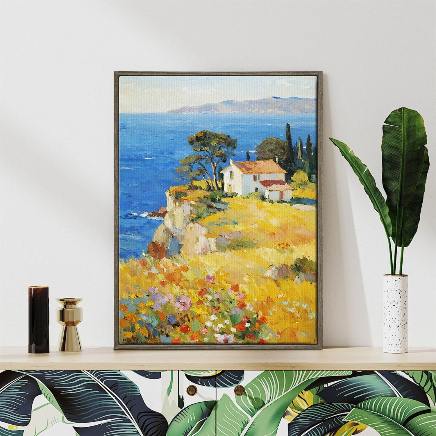 coffee frame wall art painting depicting a cliffside cottage by the sea