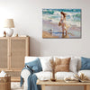 wall art painting in the living room depicts a woman in a flowing long dress walking on the beach, accompanied by seagulls.